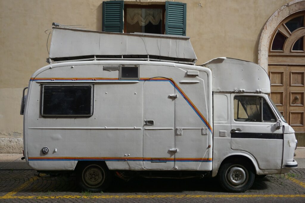 White camper van with storage on top
